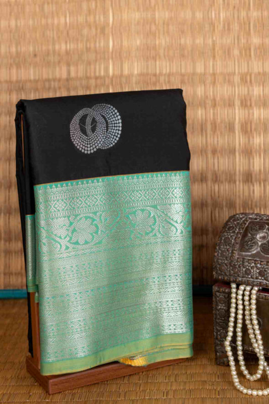 Black and green semi silk saree