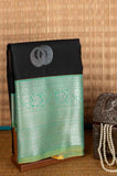 Black and green semi silk saree