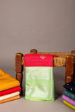 Aqua green and reddish pink semi silk saree
