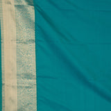 Maroon teal green semi silk saree