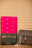 strawberry pink and green semi silk saree