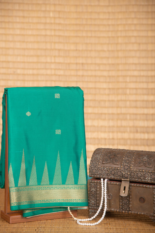 Jungle green temple border semi silk saree