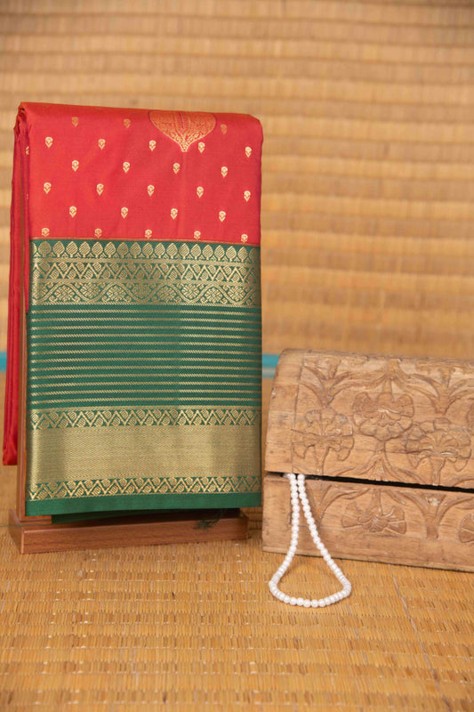 Tomato red and green semi silk saree)