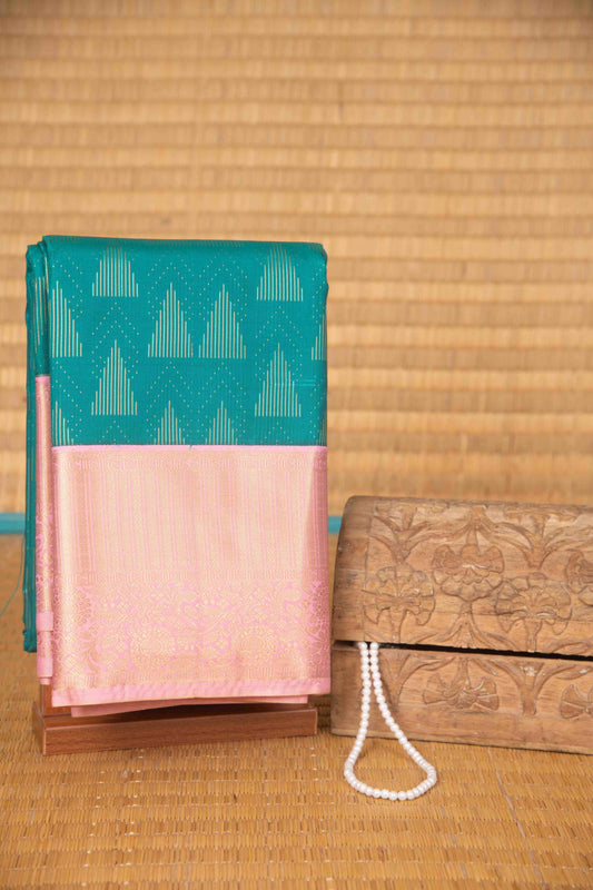 Aqua blue and baby pink brocade semi silk saree