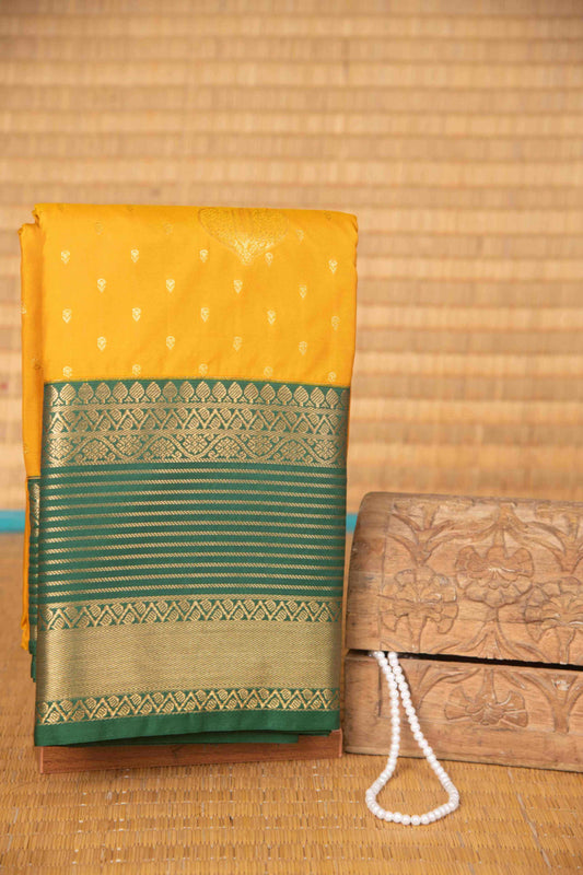 Marigold yellow and green semi silk saree