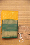 Marigold yellow and green semi silk saree