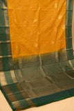 Marigold yellow and green semi silk saree