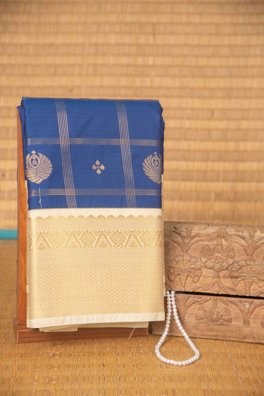 Cobalt blue and cream checked semi silk saree