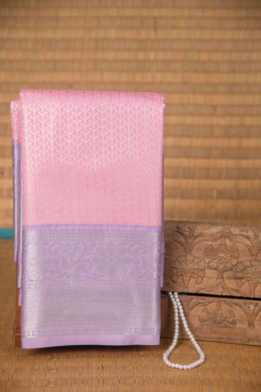 Pastel pink and lavender brocade semi silk saree