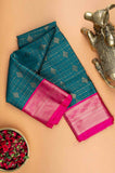 Peacock green and pink semi silk saree