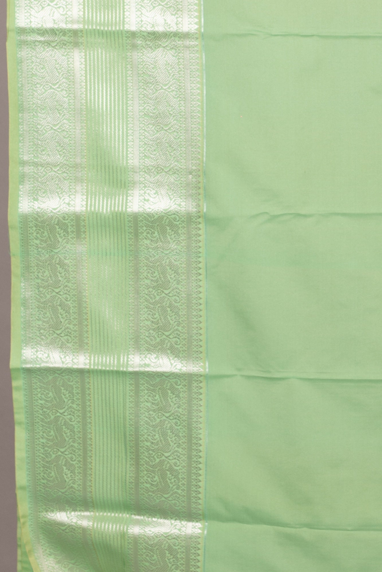 Aqua green and reddish pink semi silk saree