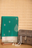Emerald green and artichoke green semi silk saree