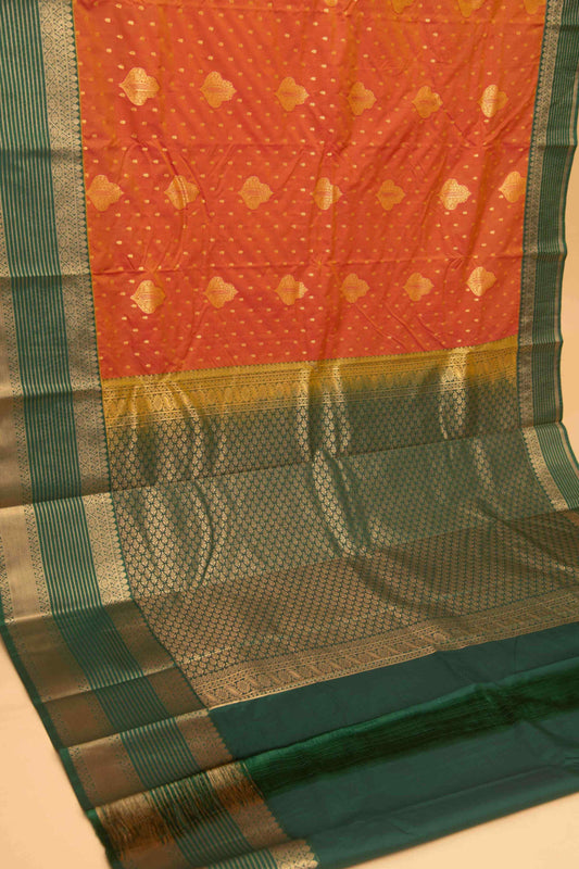 Golden orange and dark green semi silk saree