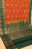 Golden orange and dark green semi silk saree