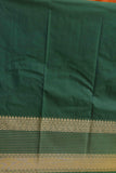 Golden orange and dark green semi silk saree