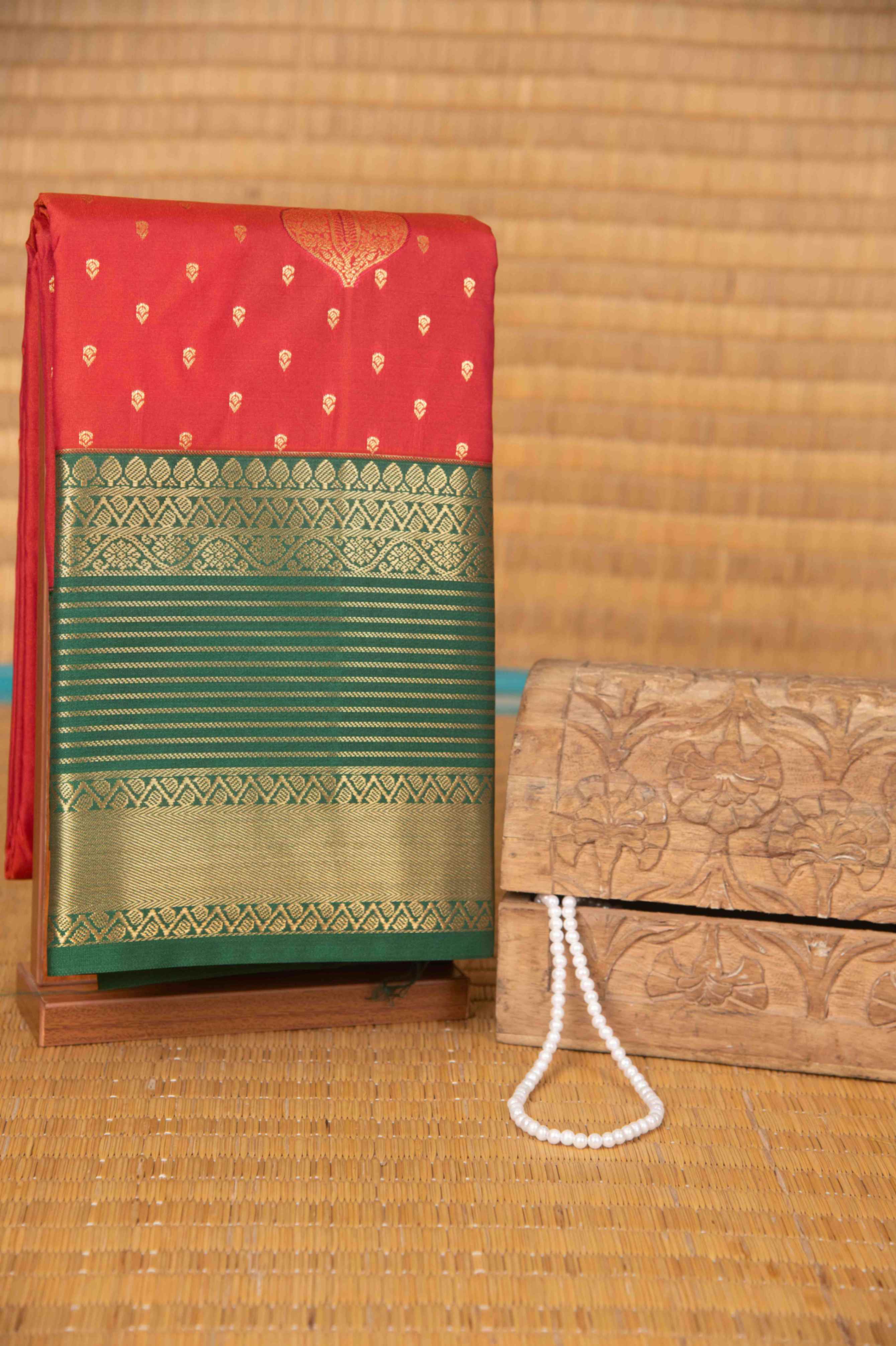 Tomato red and green semi silk saree)