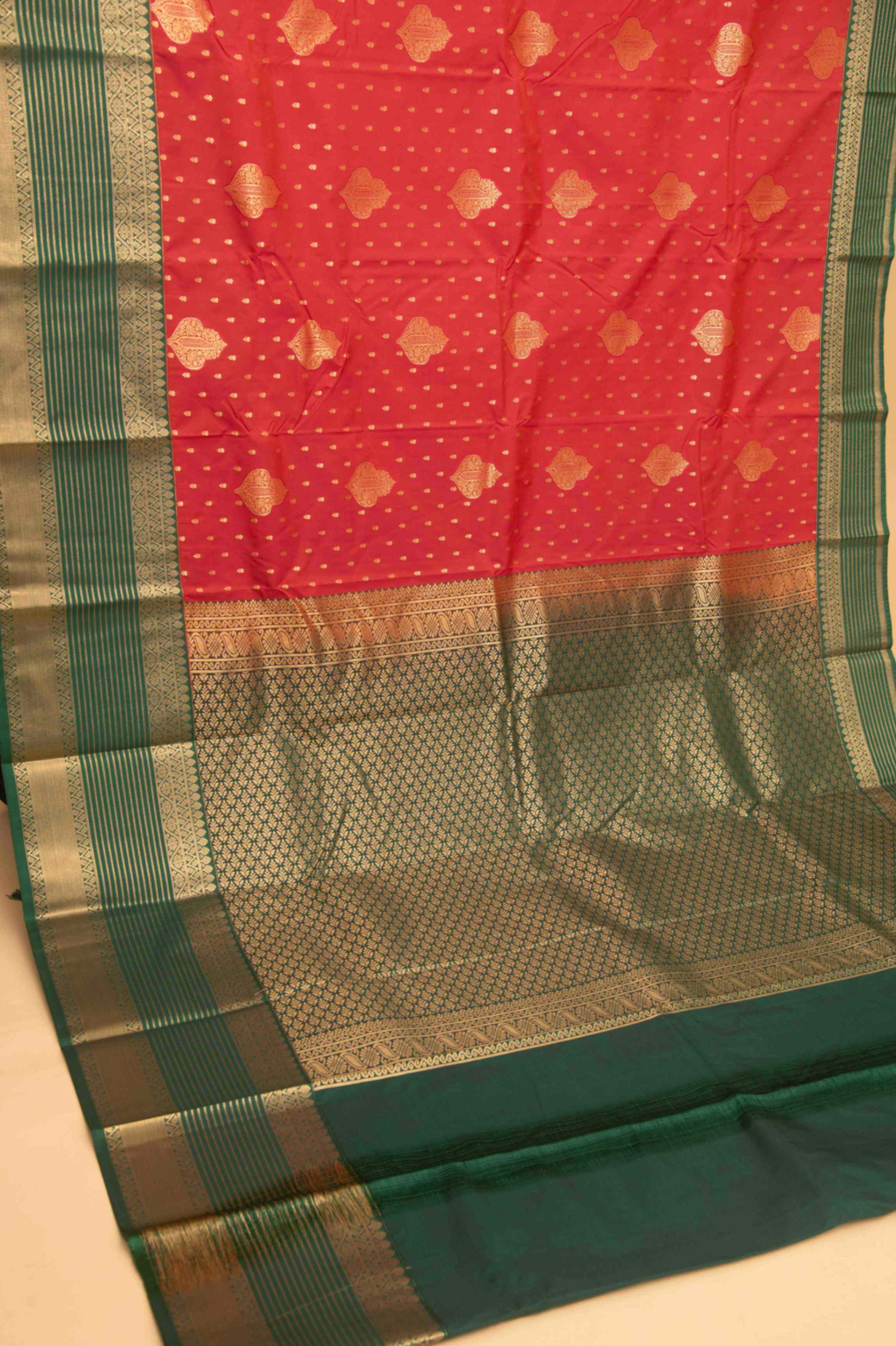 Tomato red and green semi silk saree)