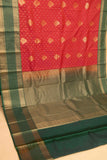 Tomato red and green semi silk saree)