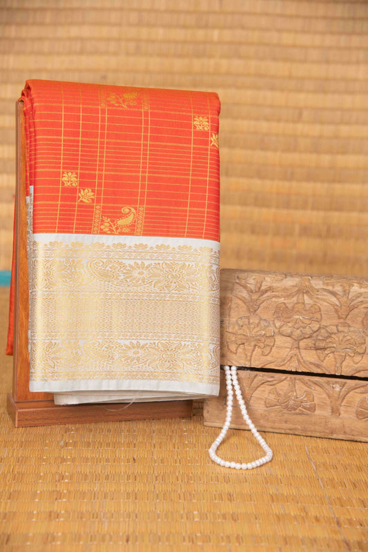 Tangerine orange and grey zari kattam semi silk saree