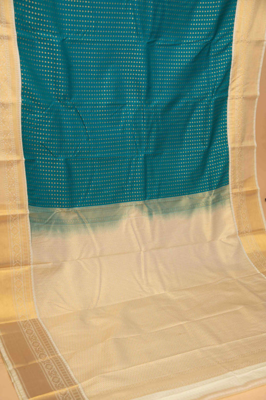 Capri blue aayiram butta semi silk saree