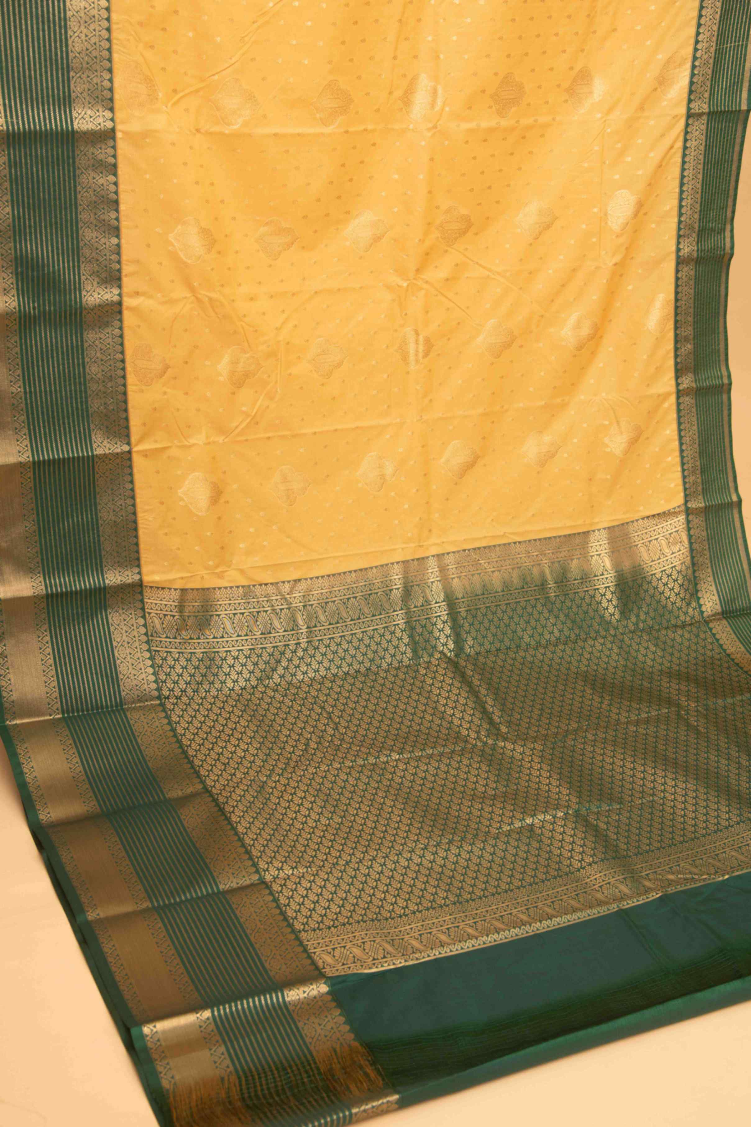 Malai cream and green semi silk saree