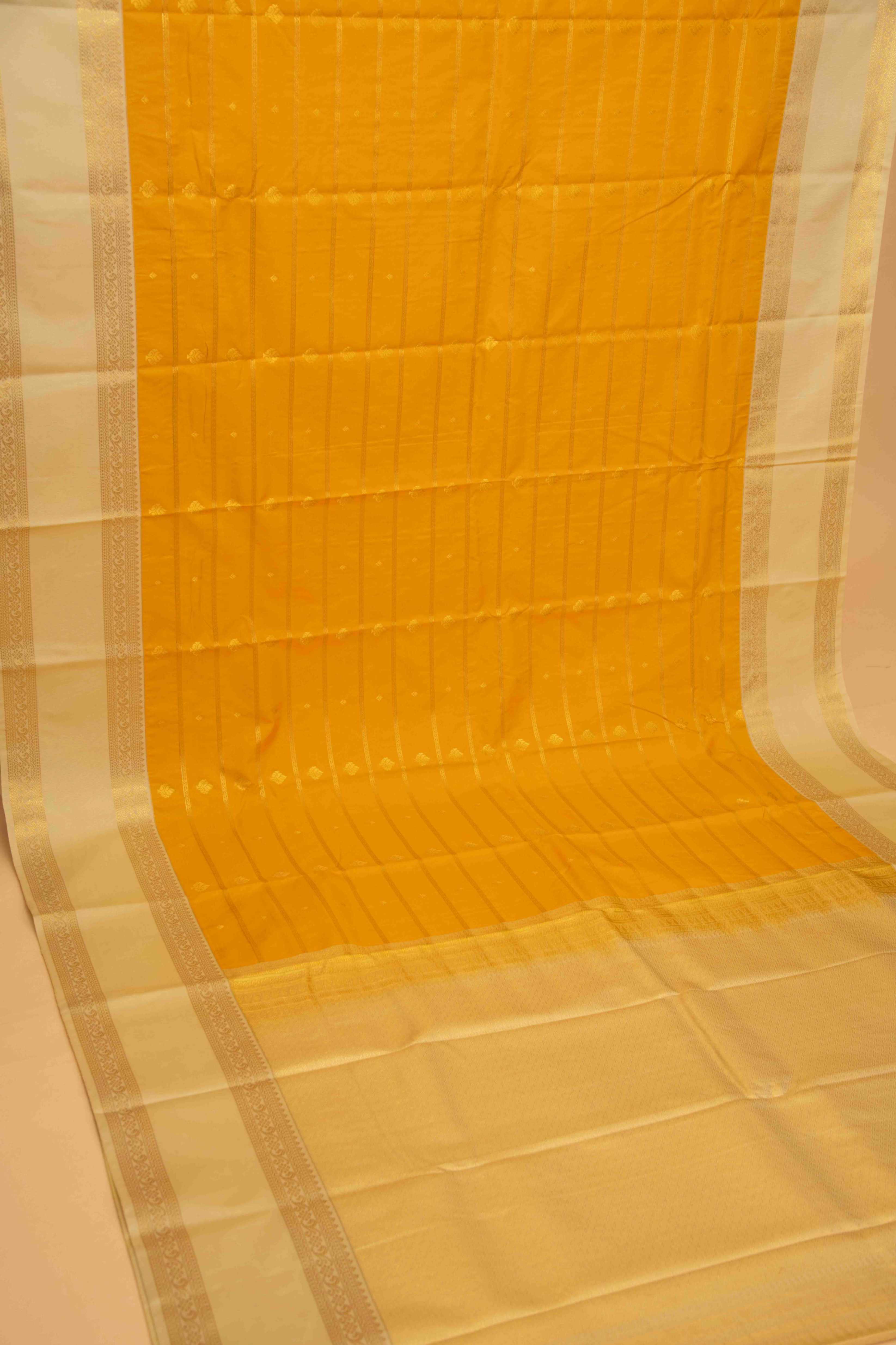 Canary yellow veldhari semi silk saree