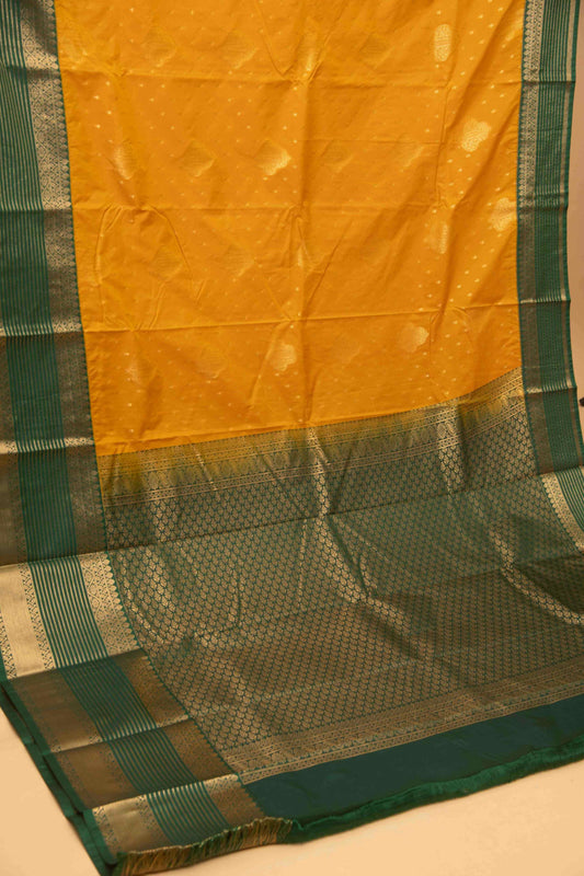 Marigold yellow and green semi silk saree