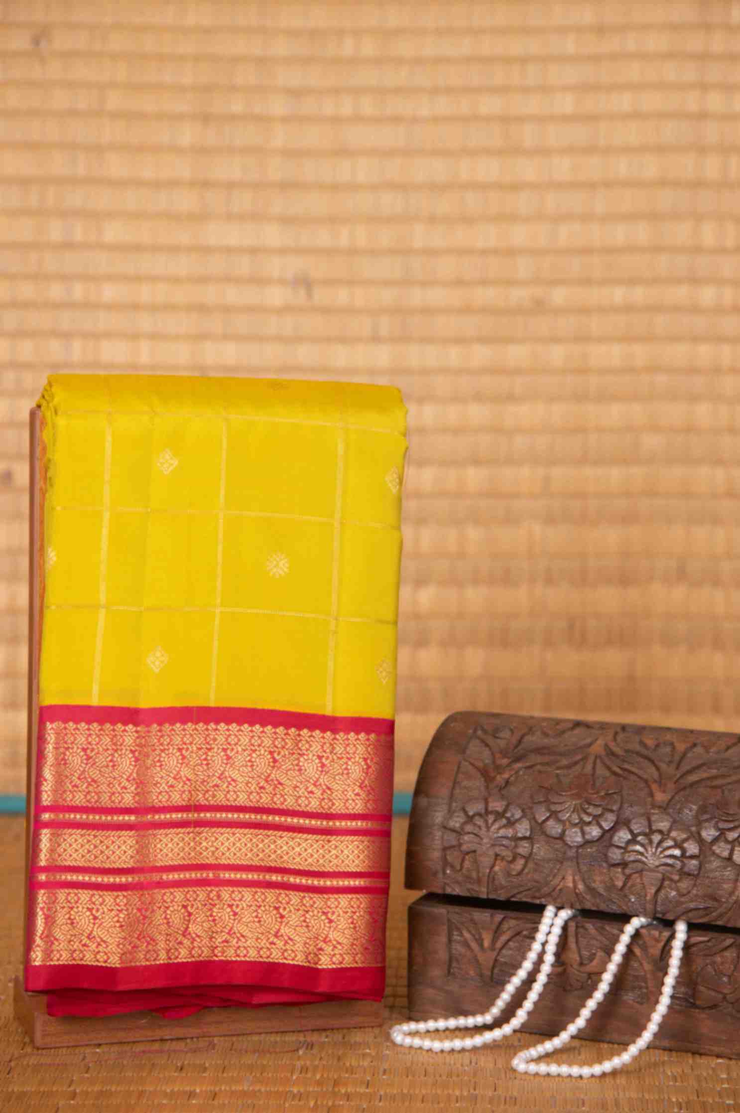 Leaf green and pink checked pure touch silk saree