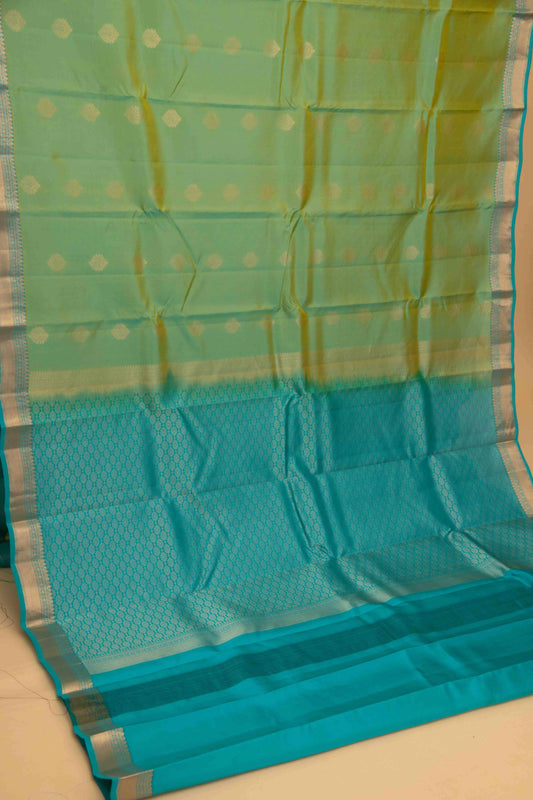 Golden green and blue pure touch silk saree