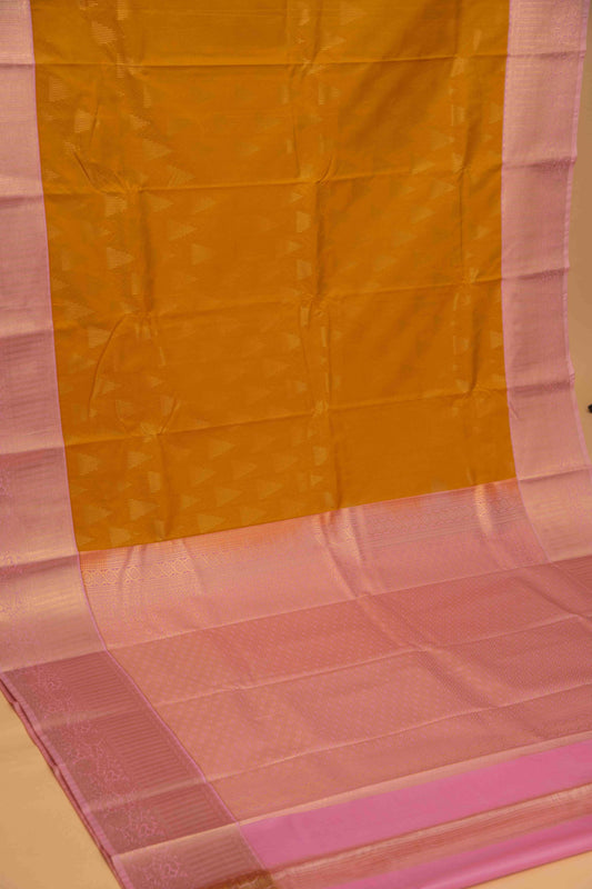 Mustard and pastel pink designer semi silk saree