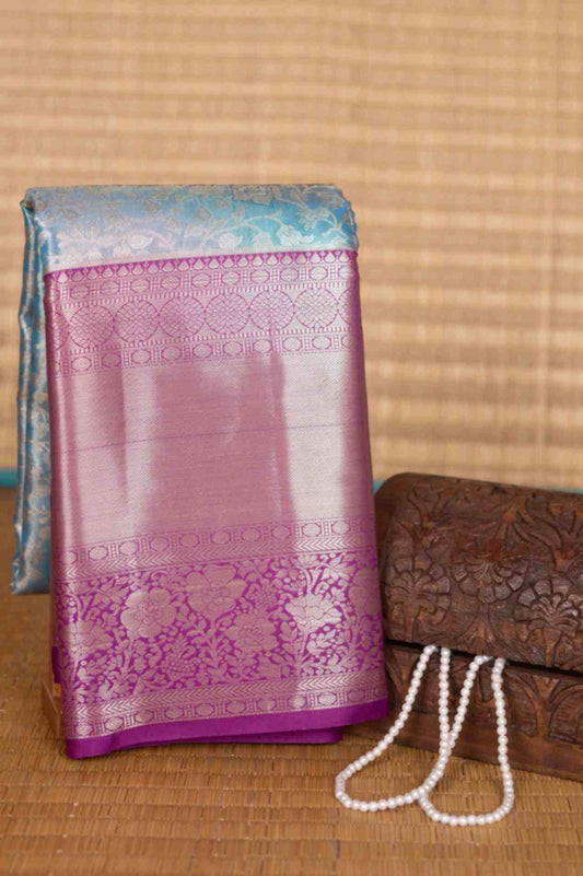 Pastel blue and purple tissue silk saree