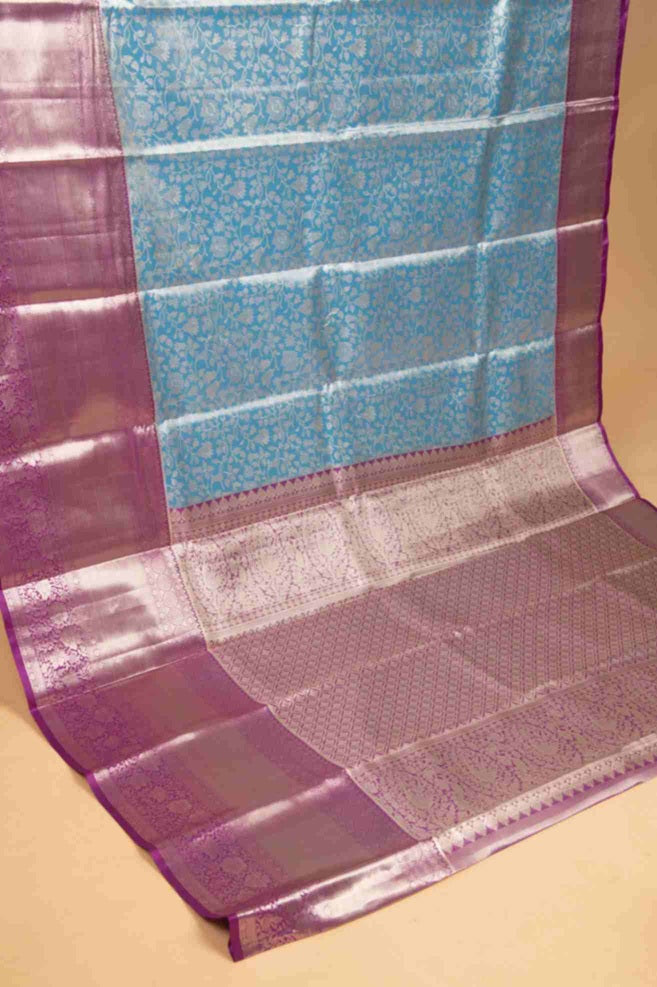 Pastel blue and purple tissue silk saree