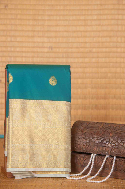 Peacock green and sage green semi silk saree